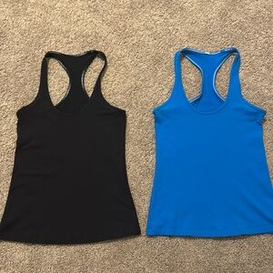Two lululemon cool racer back tanks in blue and black size 4